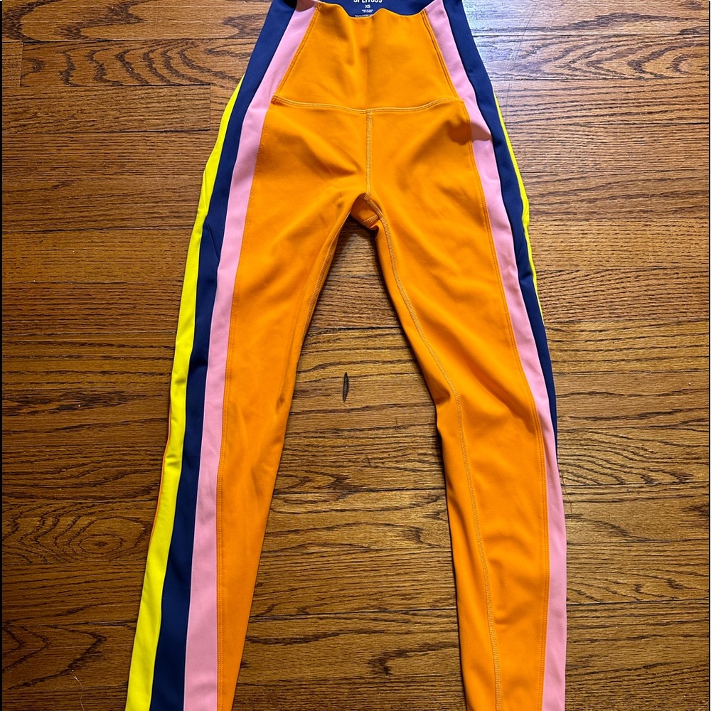 Splits59 Orange Leggings with Pink, Navy & Yellow Side Stripes